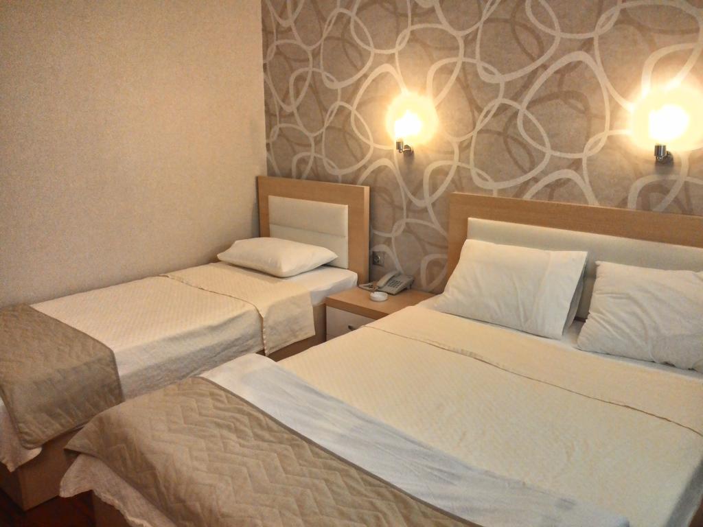 Guney Adana Otel Pokoj fotografie